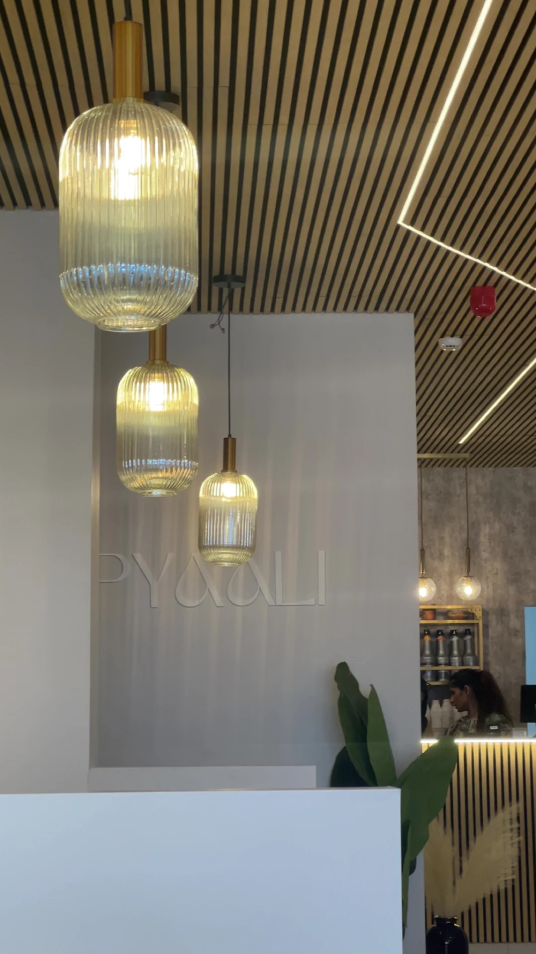 Pyaali by Jaan pendant lighting above the counter